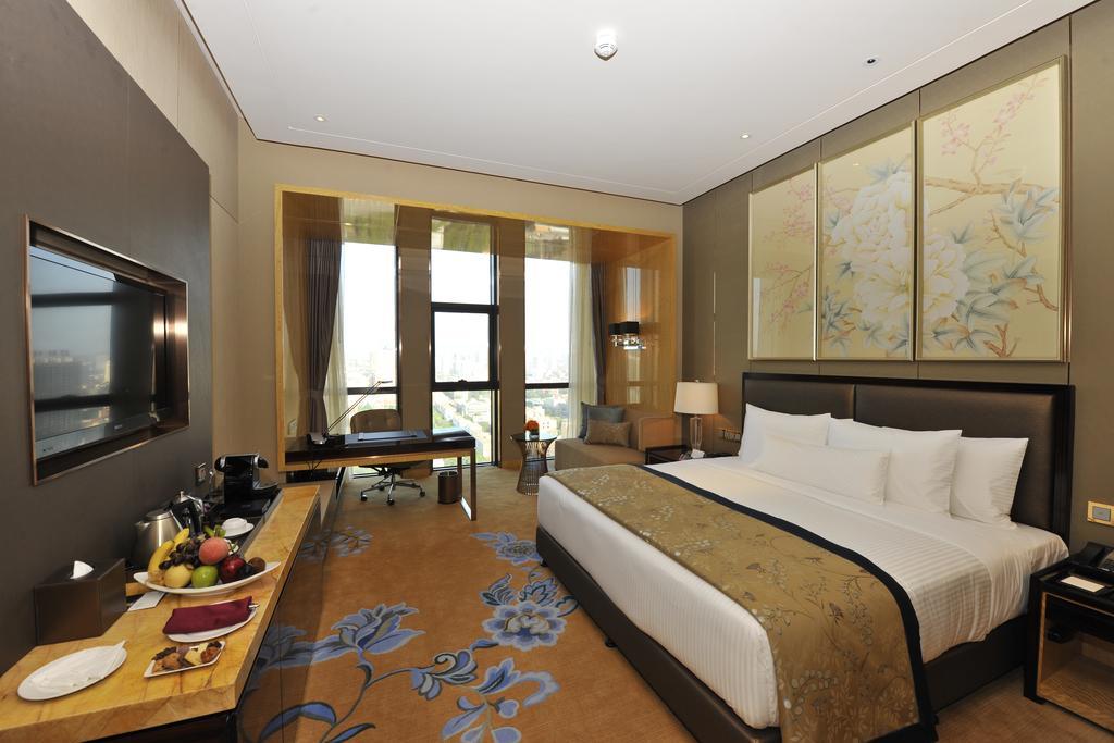 Wanda Vista Taiyuan Hotell Rum bild